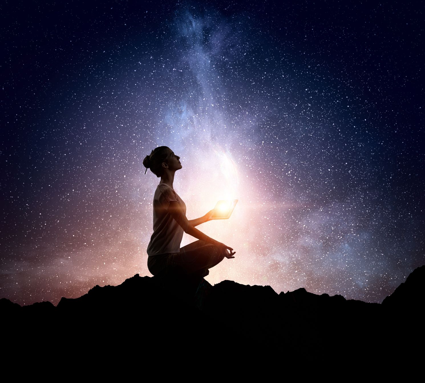 Woman meditating with the stars above her. Meditation, reflection.